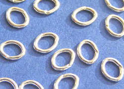  sterling silver 4.8mm x 3.25mm, 22ga (approx 0.64mm) oval open jump rings (saw cut) 