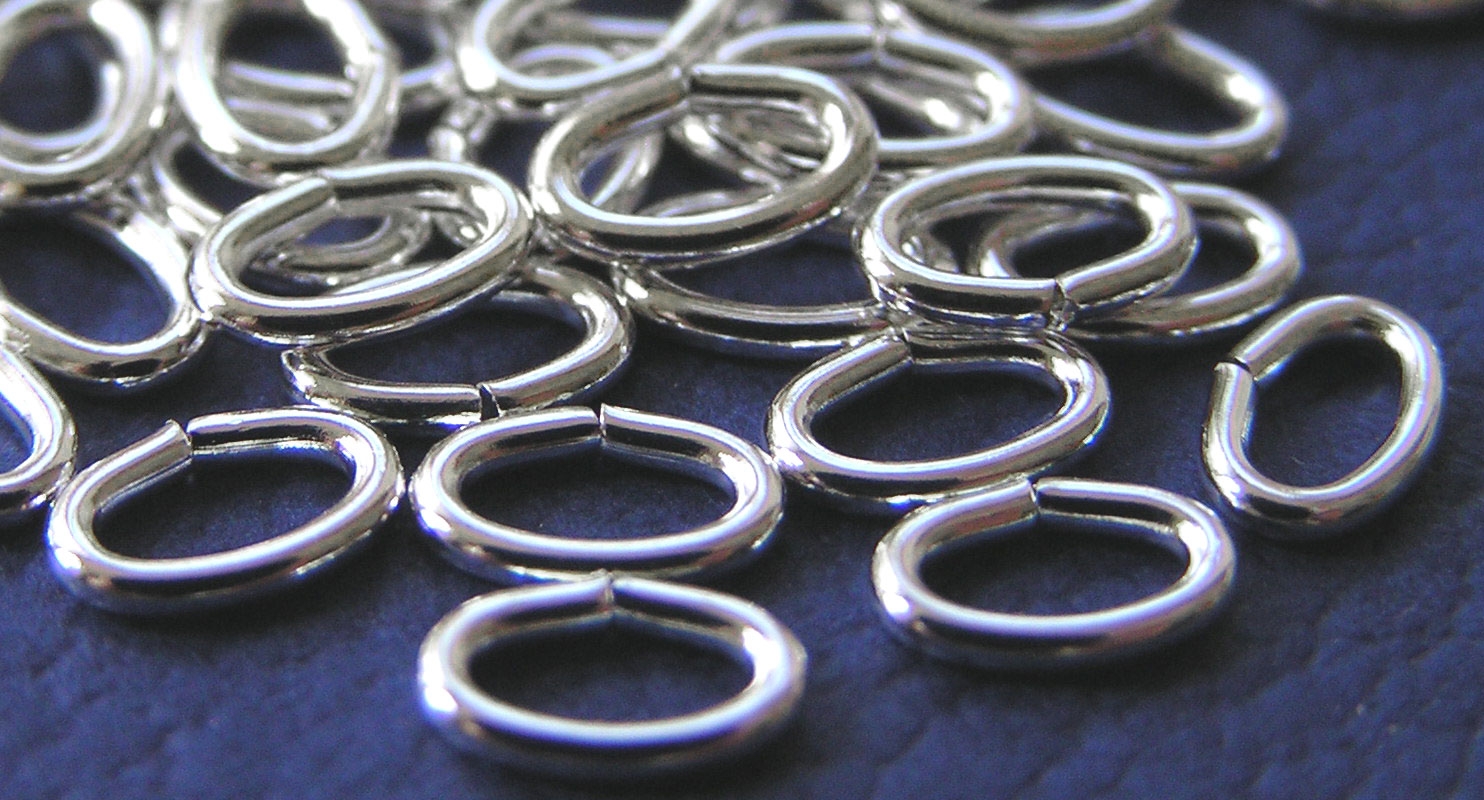  silver plated, 18 gauge, 6mm x 4mm oval open jump ring 