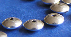  <11.4g/100> sterling silver 4.5mm x 2.8mm puffed circular disc spacer 