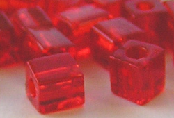  grams of transparent red miyuki shoji (#sb140) 4mm cube bead - sold per gram - aprox 10 beads per gram (pp12g) 
