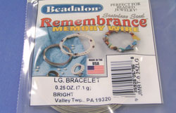  beadalon silver coloured stainless steel memory wire - large bracelet size - 63mm diameter coil - 0.65mm thick wire - approx 7g pack - roughly 15 loops per pack 