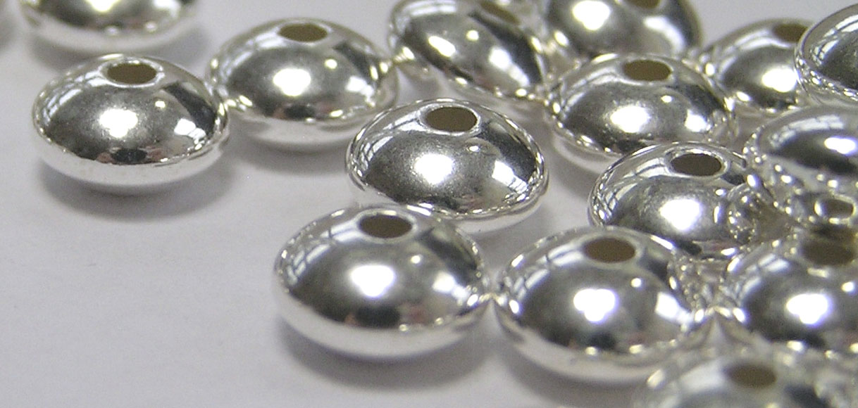  <36.50g/100> sterling silver 6.7mm x 4.2mm puffed circular disc spacer, 1.5mm hole 