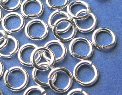  sterling silver 4mm diameter, 21 gauge (approx 0.76mm), open jump ring (saw cut) 