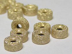 gold filled 14/20, 5mm x 2.8mm laser cut rondelle bead, 1.2mm hole 