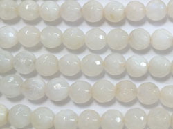  string of faceted white moonstone 6.5mm round beads - approx 60 per string 