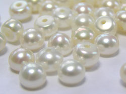  GRADE AAA, white 5.25mm round freshwater pearl HALF DRILLED, flat back & hole does not go all the way through 