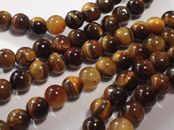  string of tigers eye 4mm round beads - approx 94 per strand 