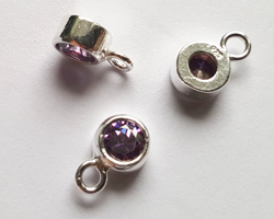  ** NEW LOWER PRICE ** sterling silver, stamped 925, 8.35mm x 5.15mm drop / charm containing a 4mm amethyst cubic zironia, very nicely made, has closed jumpring attached at the top with internal diameter of 1.5mm 