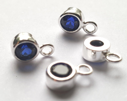  ** NEW LOWER PRICE ** sterling silver, stamped 925, 8.35mm x 5.15mm drop / charm containing a 4mm very dark blue cubic zironia, very nicely made, has closed jumpring attached at the top with internal diameter of 1.5mm 
