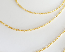 cm's - SOLD IN METRIC LENGTHS - vermeil loose 9+1 very slim figaro chain - larger chain links are 1.5mmx2mm - chain weighs ~3.5g per meter, large links easily accept a 0.8mm ring/wire [vermeil is gold plated sterling silver] 