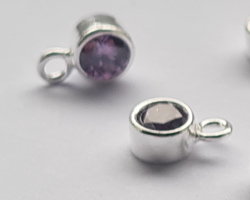  ** NEW LOWER PRICE ** sterling silver, stamped 925, 8.35mm x 5.15mm drop / charm containing a 4mm tanzanite purple cubic zironia, very nicely made, has closed jumpring attached at the top with internal diameter of 1.5mm 