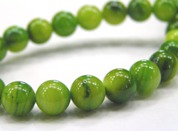  string of green mother of pearl 4mm round beads - approx 95per strand 