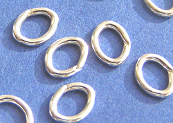  sterling silver 9.5mm x 6.5mm, 16 gauge (approx 1.3mm) oval open jump rings (saw cut) 
