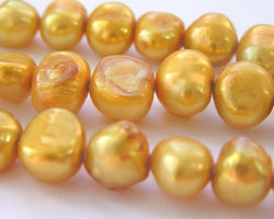  fresh water gold 7mm x 6mm (very variable) pebble pearl 