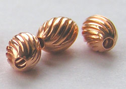  copper 4.5mm x 3mm corrugated oval beads, 0.6mm hole 