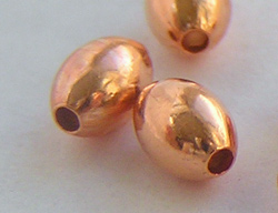  copper 5mm x 3.25mm plain oval beads 