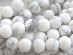  string of white howlite 6mm (variable) round beads - approx 64 per string 