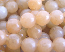  string of peach aventurine 4mm round bead - there are approx 90 beads per string 