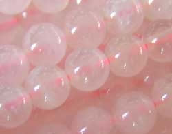  string of rose quartz 4mm round beads - approx 100 beads per string 