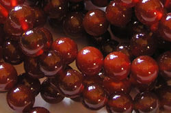  string of red carnelian 8mm round beads - approx 50 beads per strand 