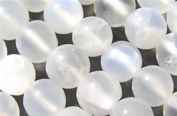  string of white moonstone 4mm (very variable) round beads - approx 100 per string 