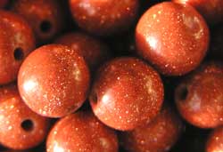  string of goldstone 8mm round beads - approx 51 per strand 