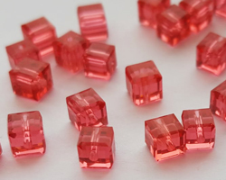  swarovski glass 5601 padparadscha 4mm cube bead 