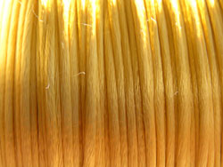  spool of gold bugtail - multistranded satin - approx 1mm thick - sold per 200 foot reel only 