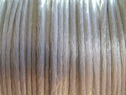 spool of silver bugtail - multistranded satin - approx 1mm thick - sold per 200 foot reel only 