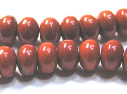  string of terracotta red jasper 6.5mm x 5mm (variable) puffed rondelle beads - approx 116 per string 