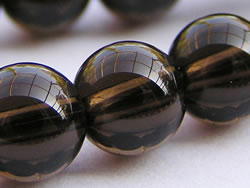  short string of smokey quartz 6mm round beads - approx 32 per string 