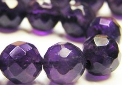  string of amethyst 8mm faceted round beads - approx 50 per string 