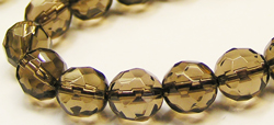  string of smokey quartz 8mm faceted round beads - approx 40 per string 