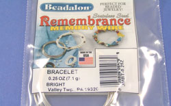  beadalon silver coloured stainless steel memory wire -bracelet size - 55mm diameter coil - 0.6mm thick wire - approx 7g pack - roughly 18 loops per pack 
