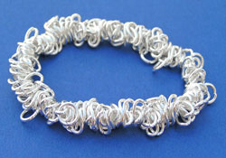  silver plated elasticated chain bracelet, with open jumprings attached ready to add charms 