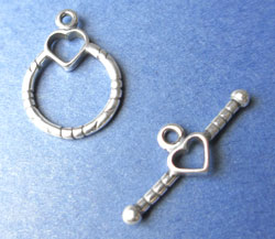  --CLEARANCE--  sterling silver, stamped 925, patterned 13.9mm diameter ring and 22mm bar, both with matching heart detail, toggle set 