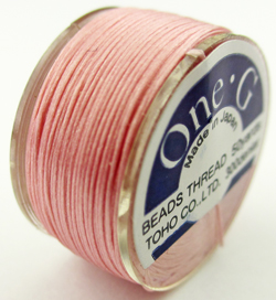  50 yard One-G TOHO bobbin of pink nylon beading thread - 300 denier 
