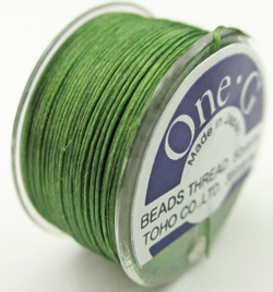  50 yard One-G TOHO bobbin of green nylon beading thread - 300 denier 