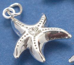 sterling silver 17.6mm x 13.7mm puffed star fish charm c/w open jump ring 