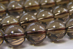  short string of smokey quartz 8mm round beads - approx 25 per strand 