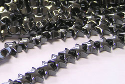  string of hematite, AA GRADE, 6mm x 3mm puffed star beads - approx 65 per string 