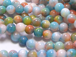  string of multicoloured, mostly pastels, jade 6mm round beads - approx 68 beads per string 