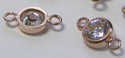  ROSE GOLD FILL 10.7mm clear cubic zirconia connector link, cz bezel has 4mm diameter, connecting rings have internal diameter of 1mm 