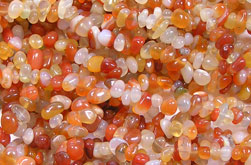 string of carnelian chip beads - total length 78cm (32 inch) - rounded edges, size of polished chunks vary between 5mm and 15mm 