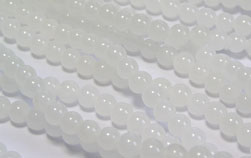  string of slightly translucent white jade 6mm round beads - approx 65 beads per string 