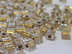  grams of clear colour lined gold (SB234) miyuki shoji 4mm cube bead - sold per gram - aprox 10 beads per gram 