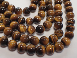 1/2 string of tigers eye 8mm round beads - approx 24 per strand 