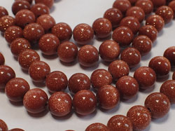  string of goldstone 6mm round beads - approx 66 per strand 