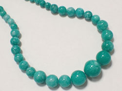  string of turquoise blue/green jade graduated round beads - sizes from 6mm thru to 14mm - approx 65 beads per strand which is 18 inches in length 