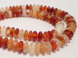  string of red agate 8.5mm x 4.3mm disc beads - approx 98 per strand 